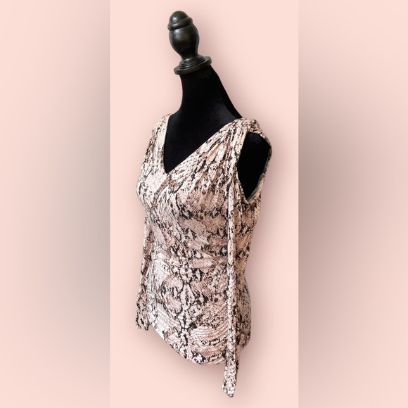 Jennifer Lopez: Brown and White Animal Print Cold Shoulder Blouse - Picture 3 of 17